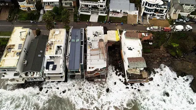 Aerial view of flooded South Shore homes after a coastal storm